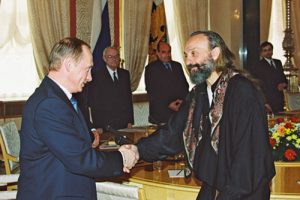 Anatoli à droite et le président Vladimir Poutine.
